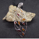 Pendentif Ambre et Argent en forme de feuille